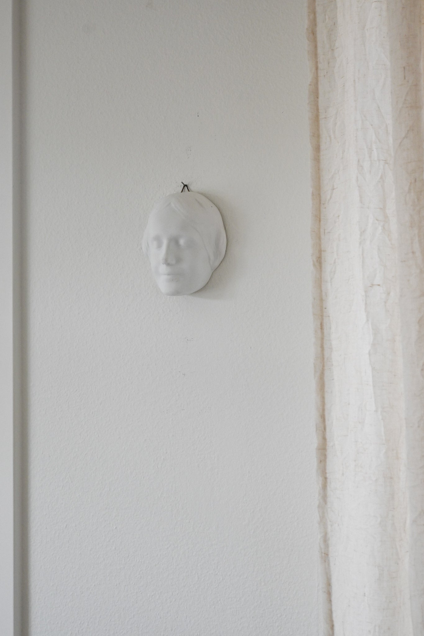 Väggrelief L'Inconnue de la Seine