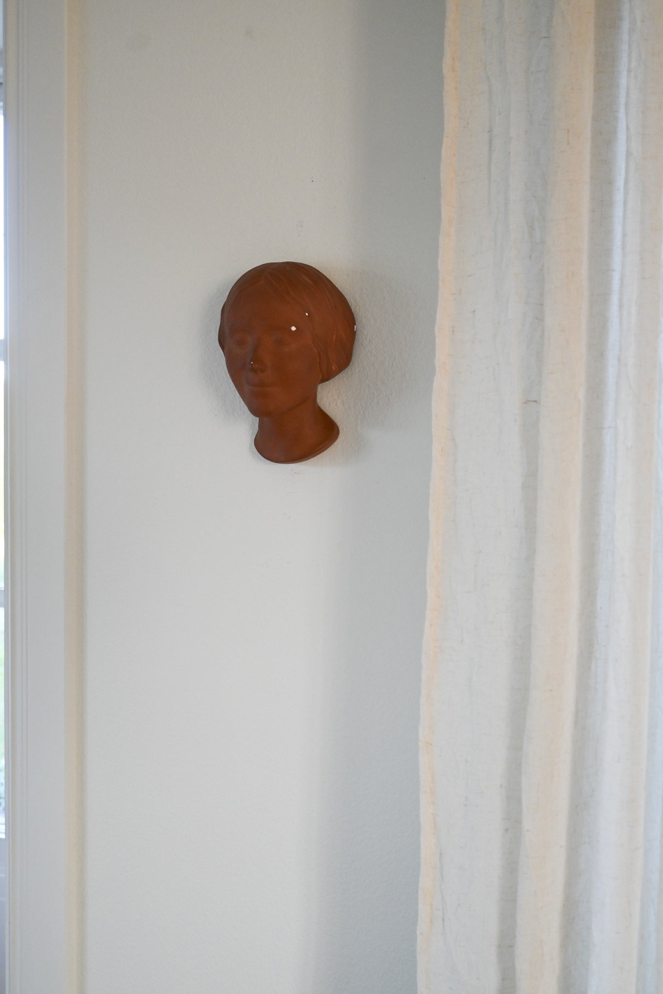 Väggrelief L'Inconnue de la Seine