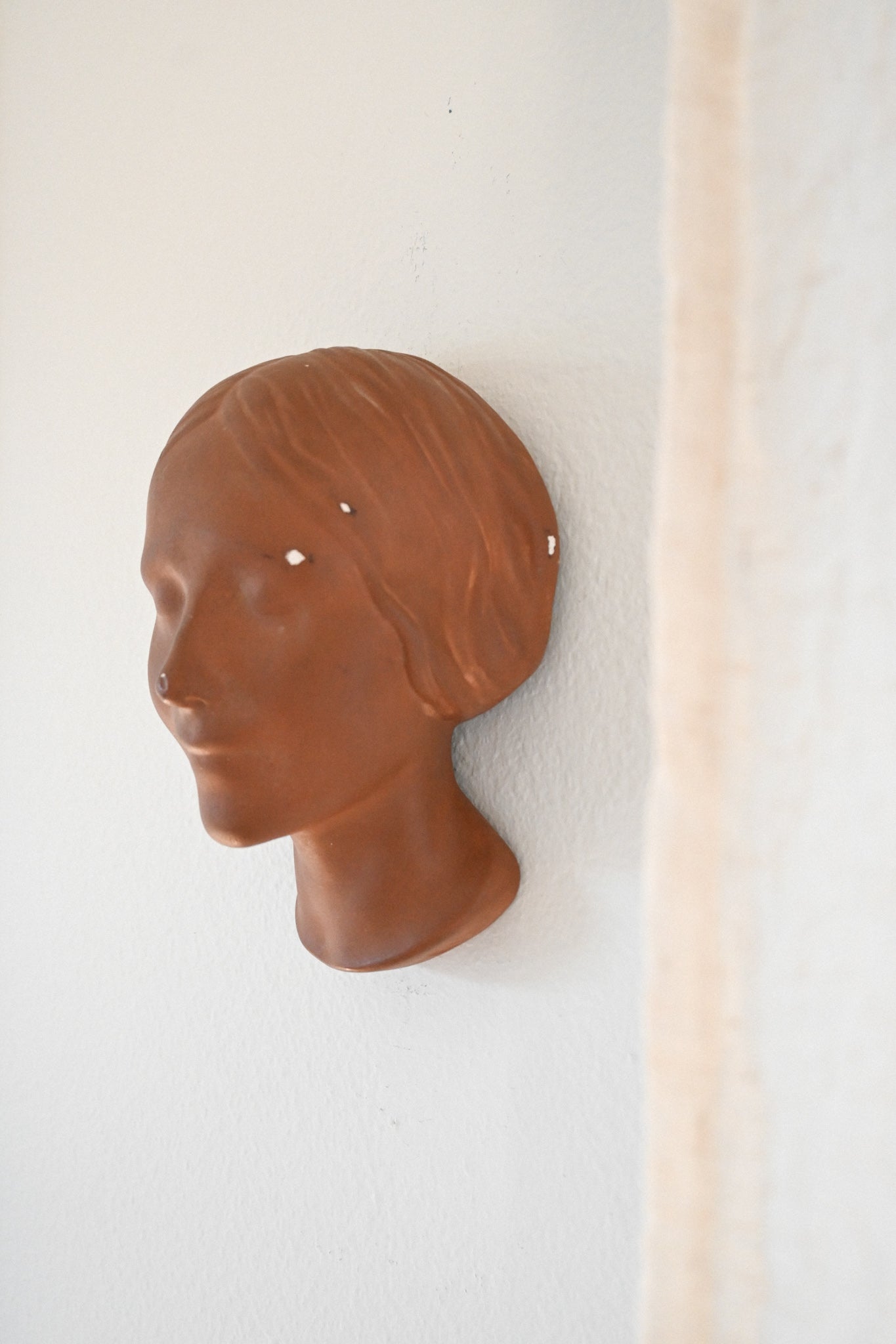 Väggrelief L'Inconnue de la Seine